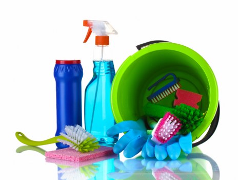 Carpet cleaning technician preparing equipment before a booked service