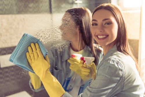 Trained carpet cleaner using equipment safely in a Hornchurch property